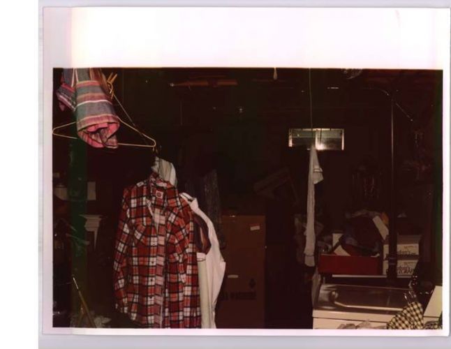 storage area with clothes hanging