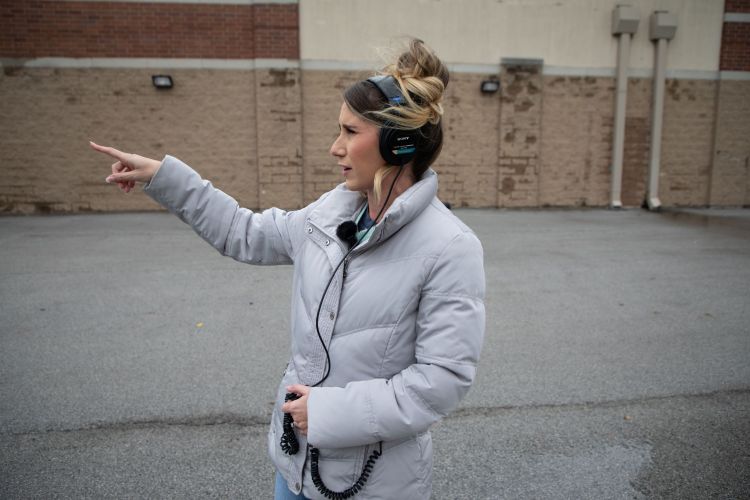 Host, Delia D’Ambra reviewing the Super Target footage while on site at Brookside Marketplace
