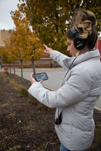 Host, Delia D’Ambra reviewing the Super Target footage while on site at Brookside Marketplace