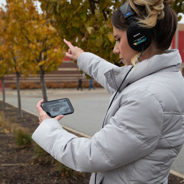 Host, Delia D’Ambra reviewing the Super Target footage while on site at Brookside Marketplace