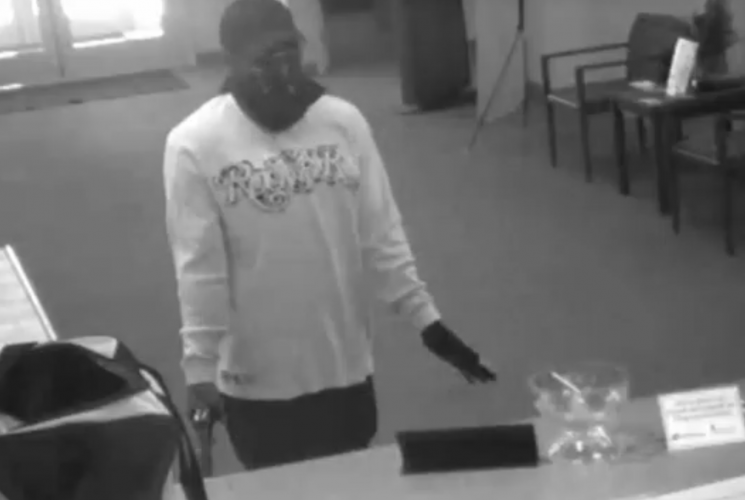 Surveillance images from inside the Fifth Third Bank on August 25th, 2008.