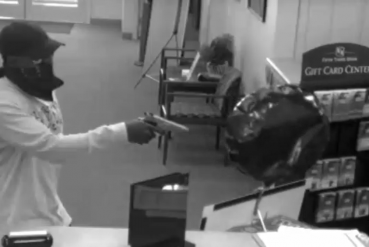 Surveillance images from inside the Fifth Third Bank on August 25th, 2008.