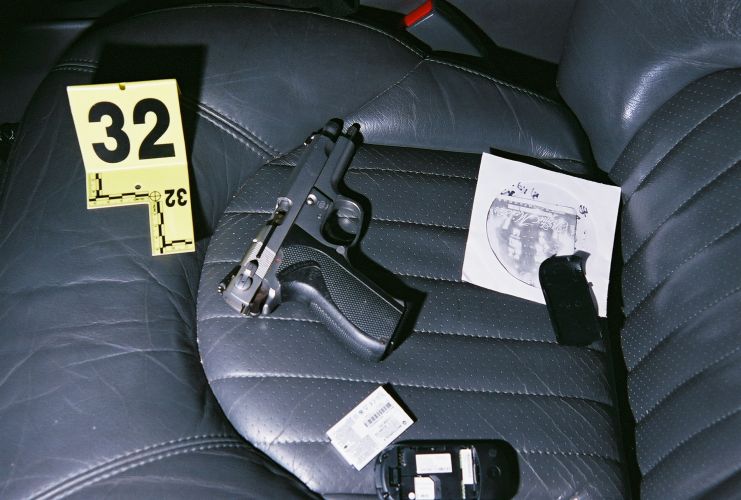 Crime scene evidence photos from where the officer-involved shooting between Raymond Maddox and Skokie PD officer Tim Gramins occurred